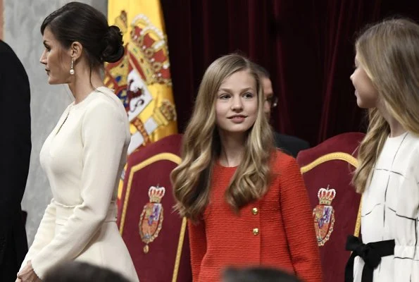 Queen Letizia, Princess Leonor and Infanta Sofía attended the Solemn opening of the Spanish Parliament. Carolina Herrera cape and dress