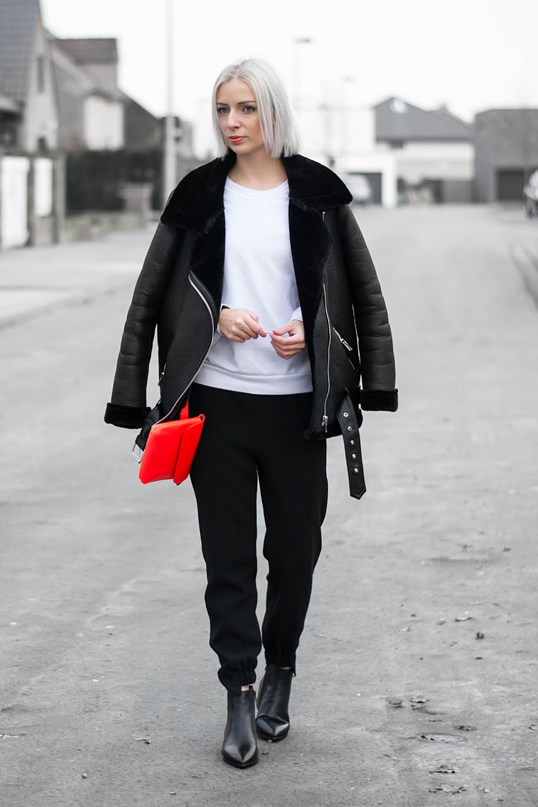 Black shearling jacket zara, white sweatshirt american apparel, zara asymmetric joggers, sacha ankle boots, acne jensen inspired, outfit