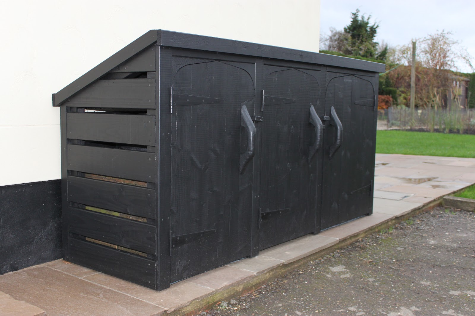 Wood Stores www.woodstores.co.uk Black wood bin store