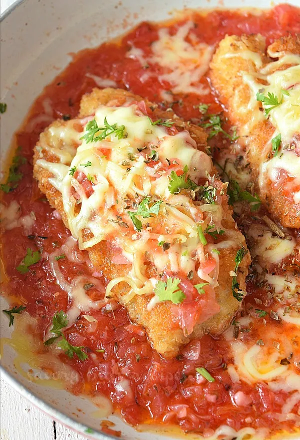 quick chicken parmesan served with mozzarella ,parsley and easy marinara sauce