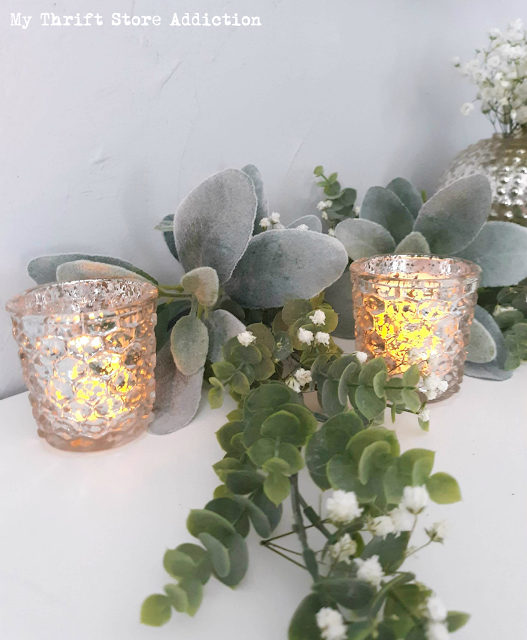 Check out my winter white mantel and gallery wall inspired by holiday clearance finds plus inspiration from 16 bloggers on the Cozy Winter Homes blog hop! Cozy winter homes mantel and gallery wall