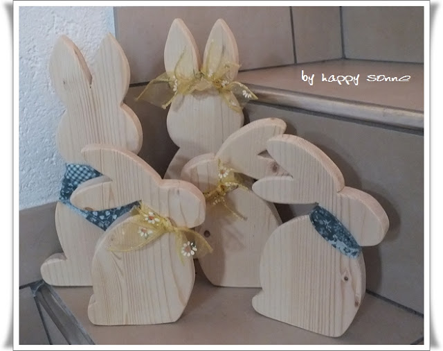 Happy Sonne: Osterhasen aus Ton und Abfallholz....