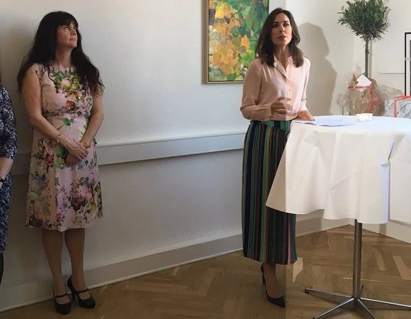 Crown Princess Mary wore Diane Von Furstenberg Tailored Asymmetric Overlay Skirt. The Danish Women's Society and The Mary Foundation.