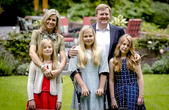King Willem-Alexander, Queen Maxima, Princess Amalia, Princess Alexia and Princess Ariane at the 2016 Summer photo shoot in Villa Eikenhorst residence of holiday summer dress.