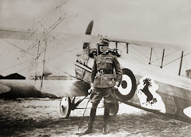 Francesco Baracca alongside his Spad XIII with the  family's prancing stallion logo displayed on the side