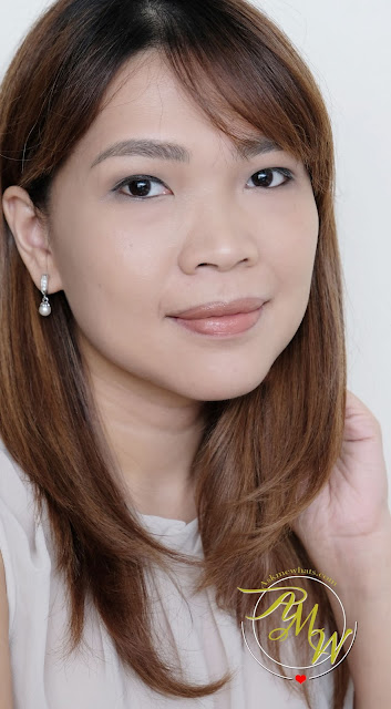 a photo of Estee Lauder Pure Color Envy Liquid Vinyl review in shade 308 Not So Innocent by Nikki Tiu of www.askmewhats.com