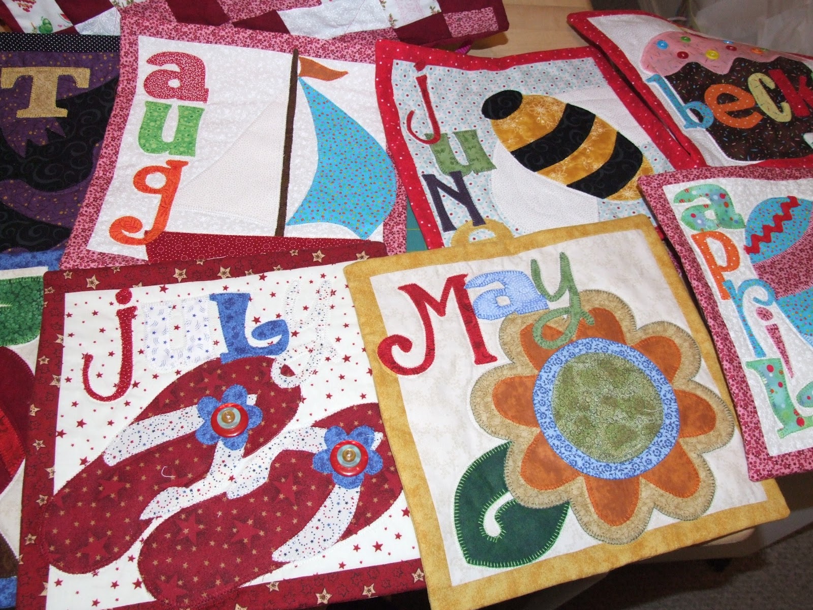 Cakes and Quilts Monthly quilt wall hangings