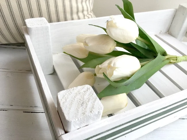 Tulips in a white wooden crate