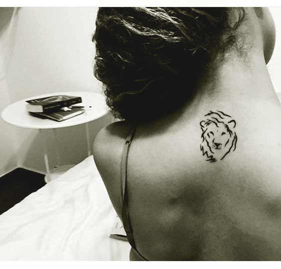 Leo face tattoo designs on back