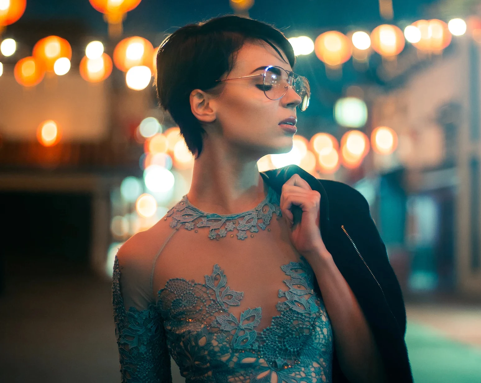 beautiful woman with a styled pixie haircut in a prom dress