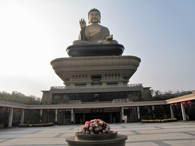 giant buddha atop memorial kaohsiung taiwan