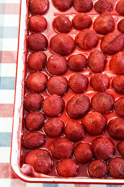 Slow Roasted Strawberries, fresh strawberries sprinkled lightly with sugar, baked slowly until the strawberries release their juices and slightly caramelize.  These strawberries go brilliantly in all kinds of desserts.