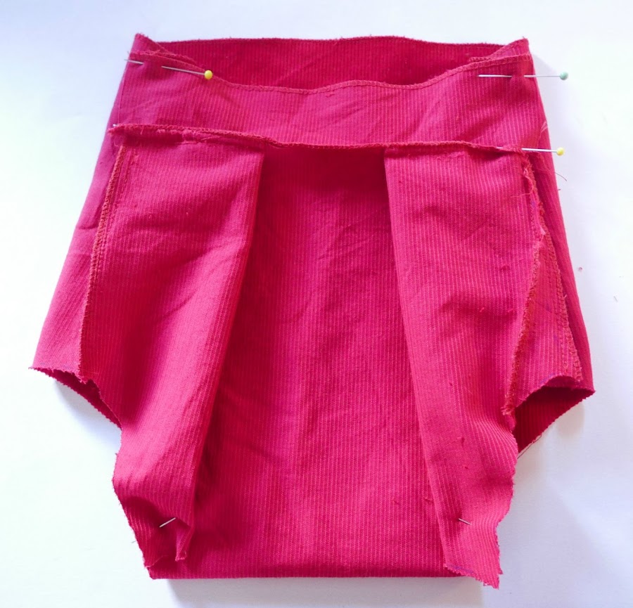 Asegurar pliegues de la ranita bebé