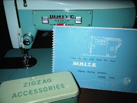 White Model 2335 Vintage Sewing Machine with Many Extra Parts