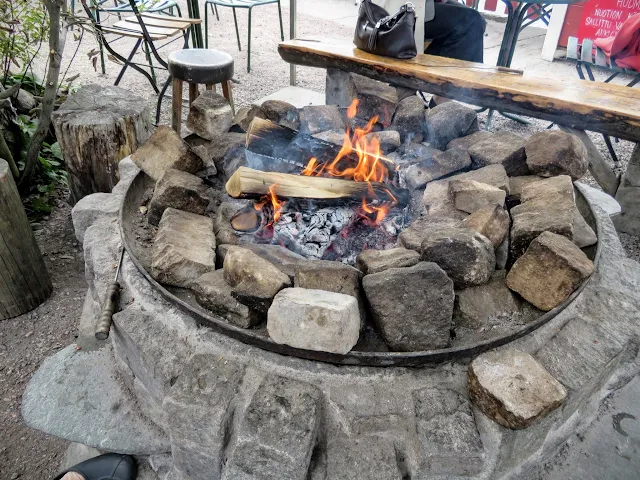 What to see in Helsinki - Outdoor fireplace at Regatta Cafe
