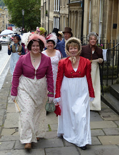 Sophie Andrews and Rachel Knowles taking part in  the 2015 Jane Austen Festival Regency  promenade © Andrew Knowles