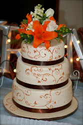 cake orange flowers ivory kim studio