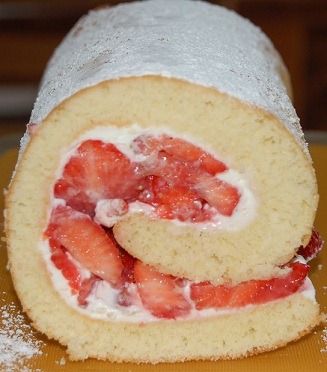 Brazo de fresas y nata (crema de leche)