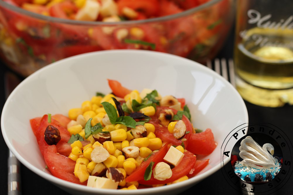 Salade tomates, maïs, gruyère aux noisettes grillées