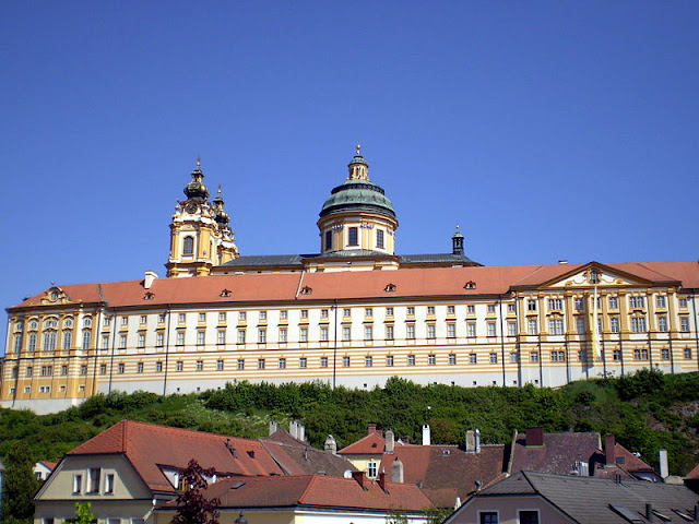 For nearly 1,000 years, the Melk Abbey still stands perched above its village below. Inside, treasures of all kinds await visitors who enter these hallowed halls. Photo: WikiMedia.org.