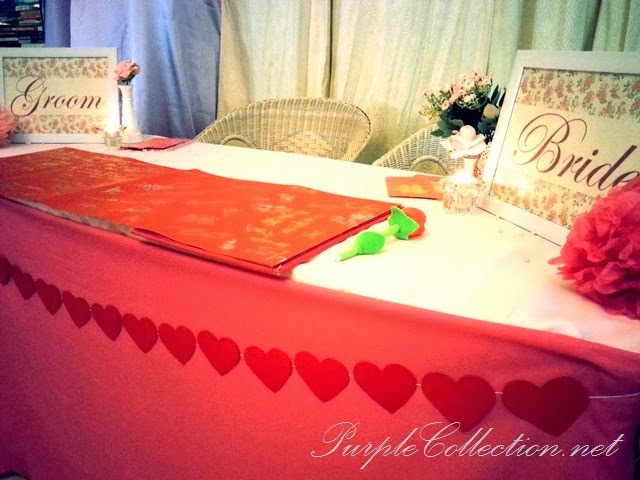 photo album viewing table decoration, wedding, event, decor, kuala lumpur, malaysia, pink theme, sweet, love, budget, package, welcome board, flower, floral, lantern, VIP chair, satin sashes, guestbook, reception table, bride and groom