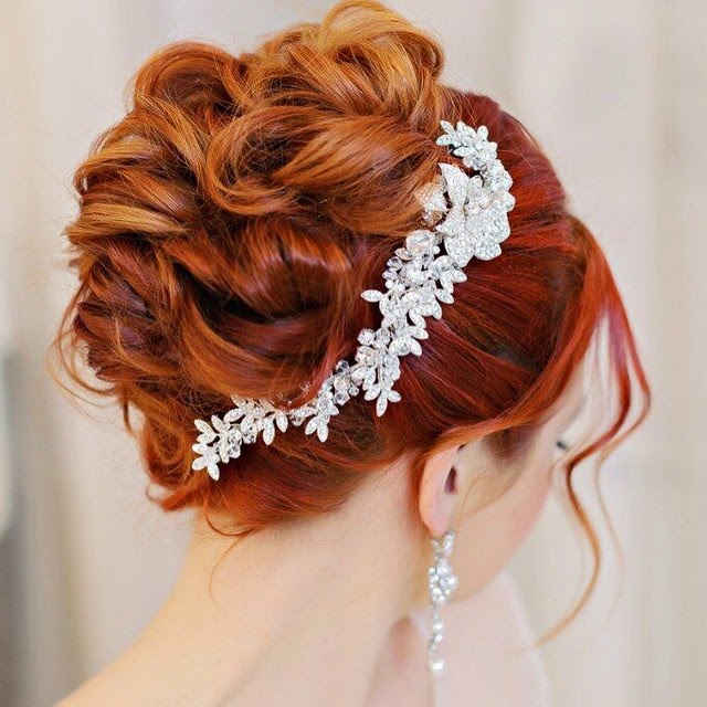 http://cassandralynne.com/products/crystal-bridal-hair-comb-in-a-rhinestone-vine-design