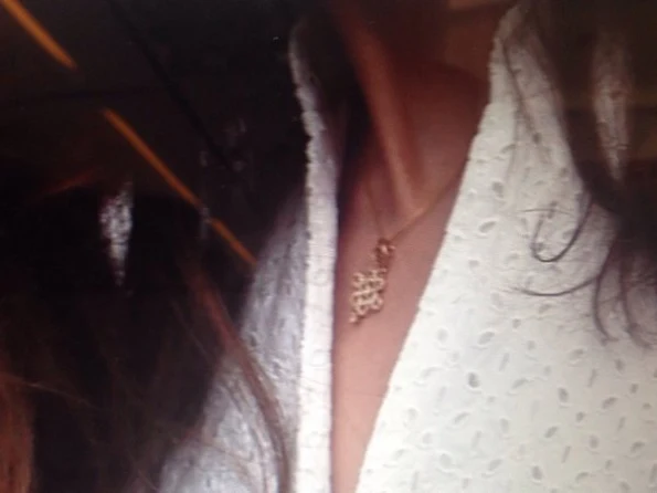 Kate Middleton wore a gold and diamond necklace given to her during the visit by Queen Jetsun of Bhutan.