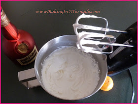 Spiked Raspberry Cocoa with Orange Whipped Cream | www.BakingInATornado.com | #recipe #cocktail