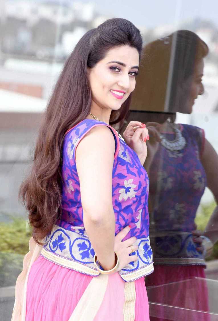 TV Anchor Manjusha Latest Stills In Violet Dress