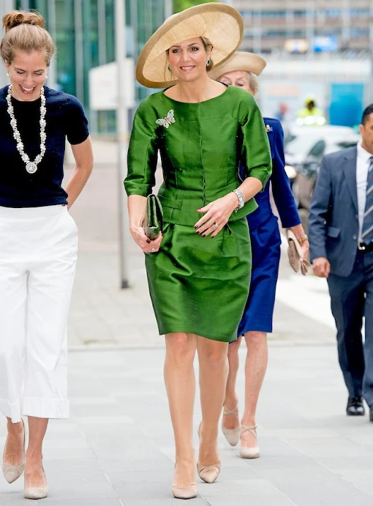 Dutch Queen Maxima attend opening 24th WPATH Symposium in Amsterdam. Queen wore Natan dress, Natan pumps, Natan Clutch, jewelry diamond earrings