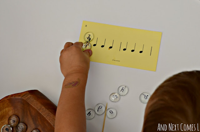 Kids music activity tray to learn about time signatures, rhythm, and bar lines