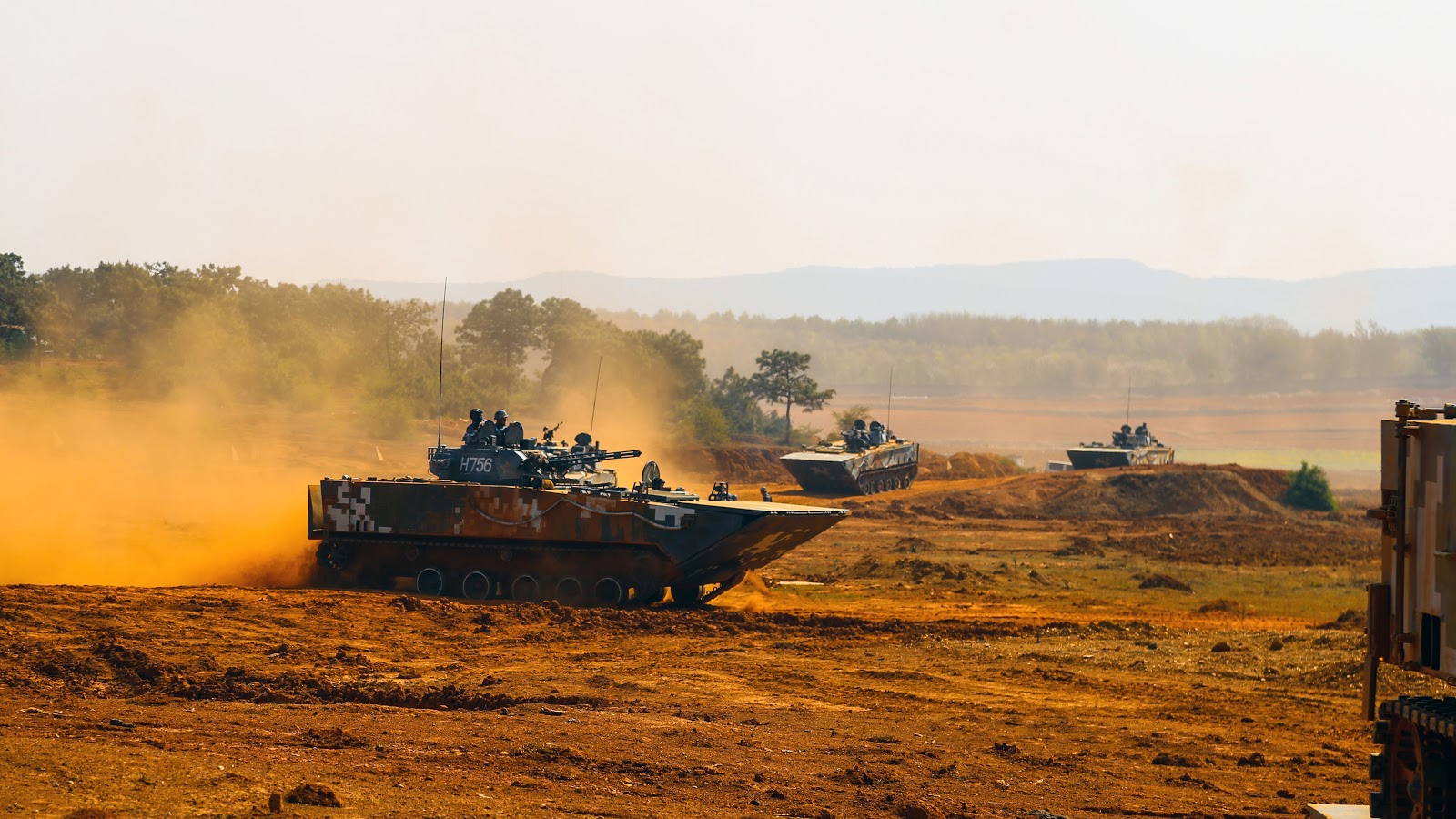 SNAFU! PLA Navy's Marine Corps kicks up plumes of dust as it moves