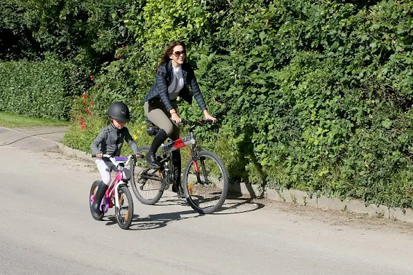 Crown Princess Mary wore Cavalleria Toscana shirt, Down Jacket, Trousers and Prada Sunglasses. Princess Josephine, Prince Vincent, Prince Christian on Summer Holiday