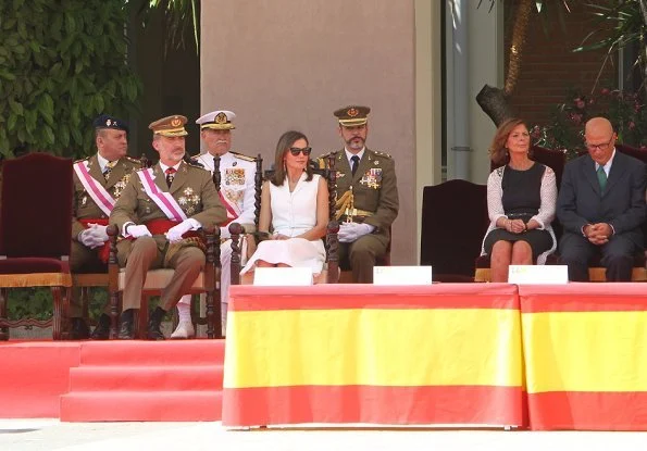 Queen Letizia of Spain wore Felipe Varela dress and Carolina Herrera suede pumps, carried Carolina Herrera bag from Camelot collection