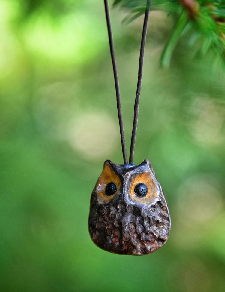 Natural looking owl Christmas ornament.
