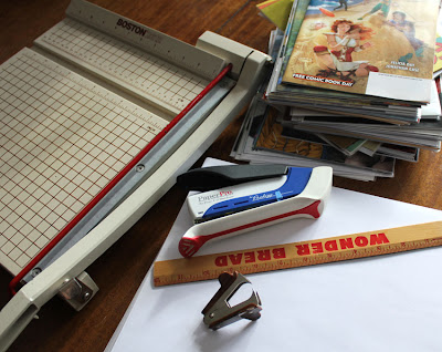 paper cutter, stapler, comic books, ruler, paper, staple remover