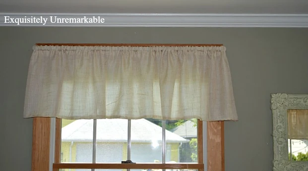 Linen valance on window with unfinished frame