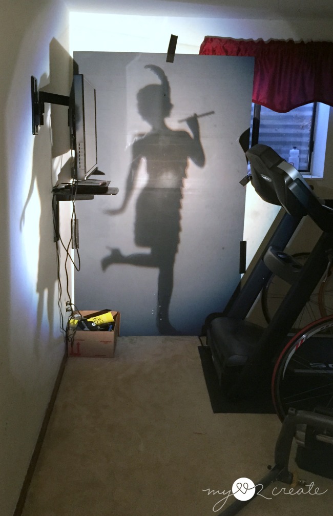using a projector to make a life sized cut out of a flapper girl
