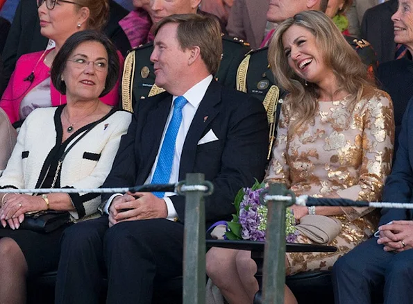 Queen Maxima and King Willem attends the Liberation Day Concert. Queen Maxima wore Jimmy Choo Tilly Metallic Pumps and Natan dress