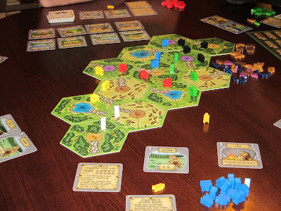 Power Grid: The First Sparks - The game board and clansmen