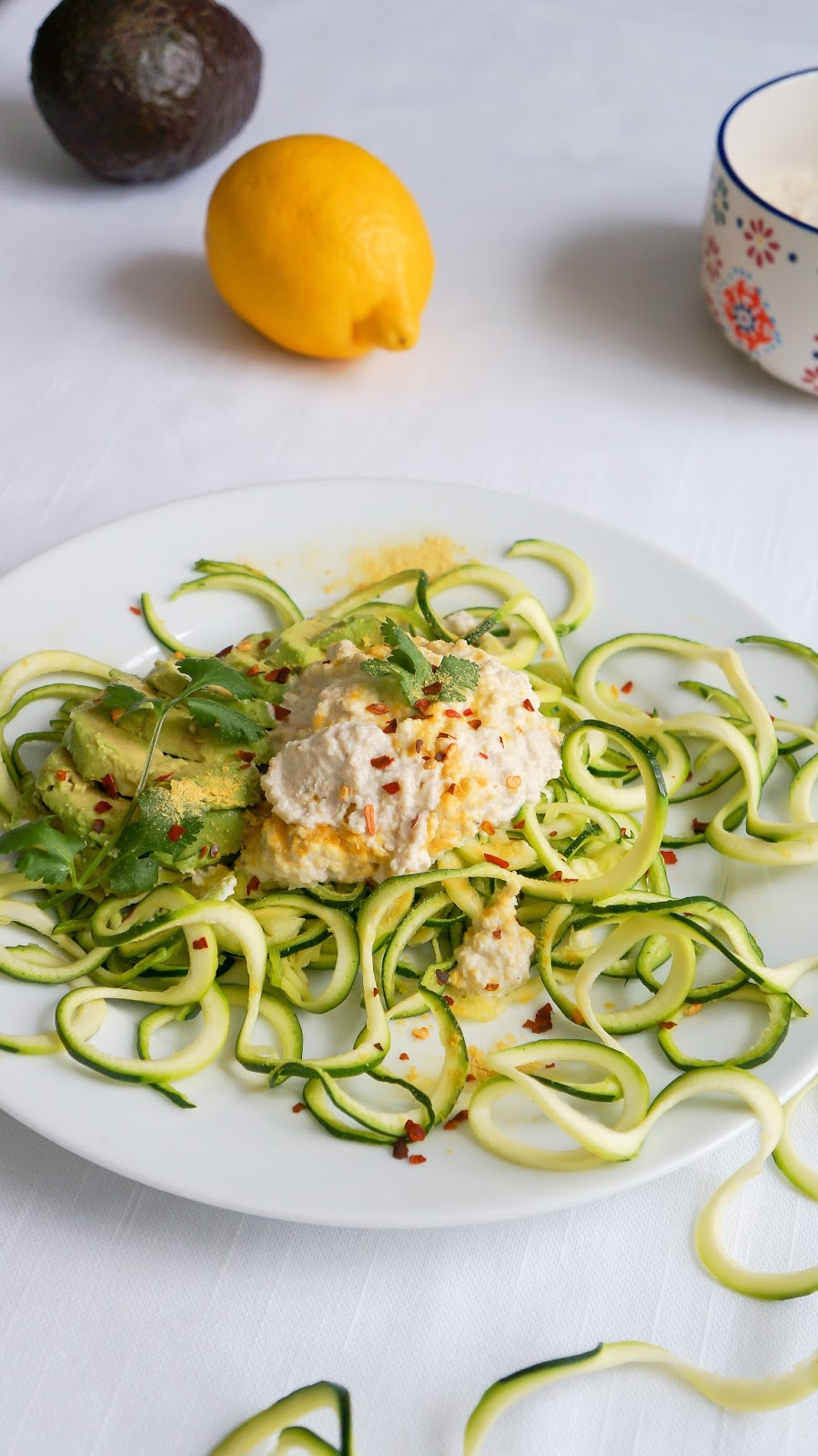 Raw vegan zoodles with avocado and cashew cream