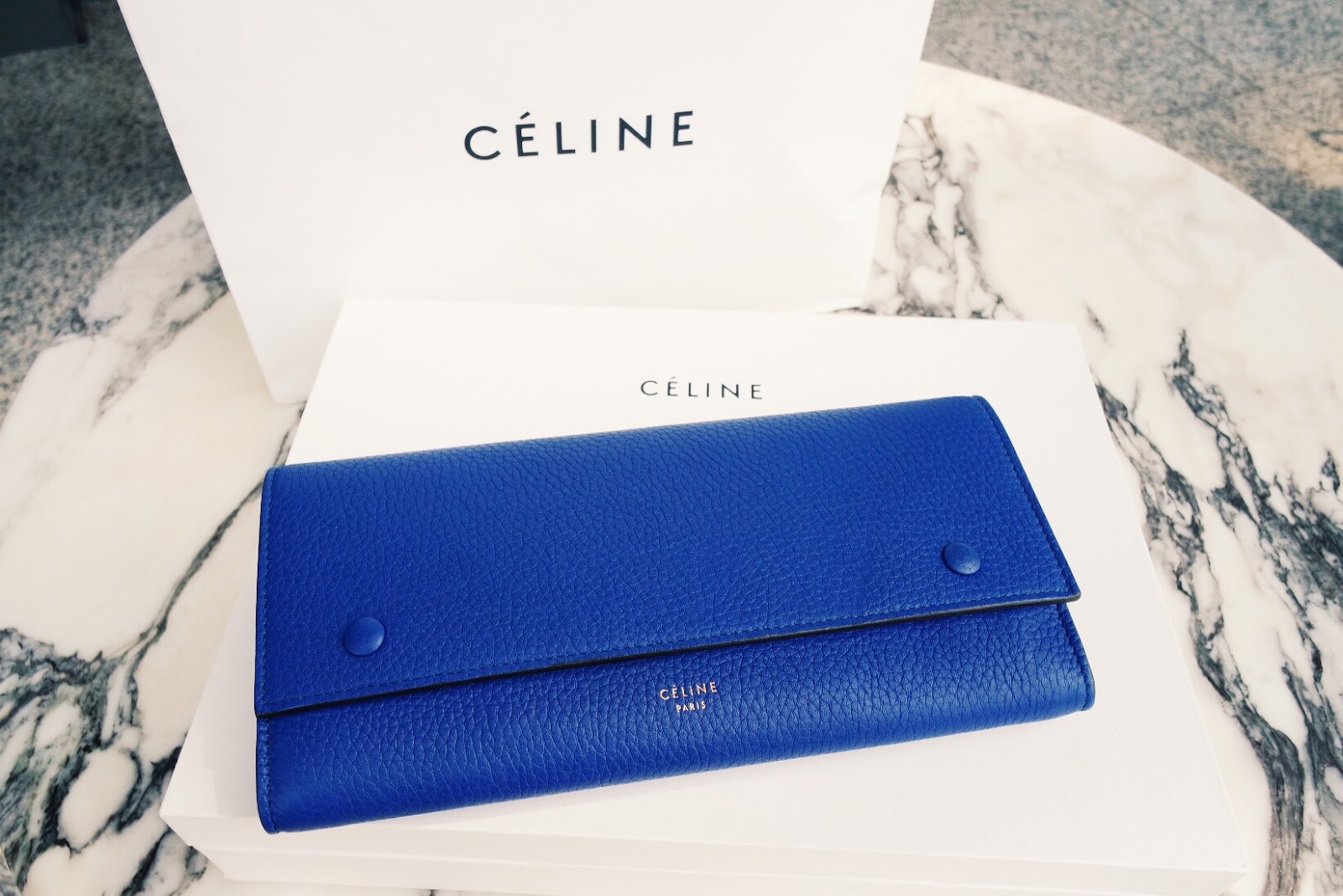 celine blue wallet present continental