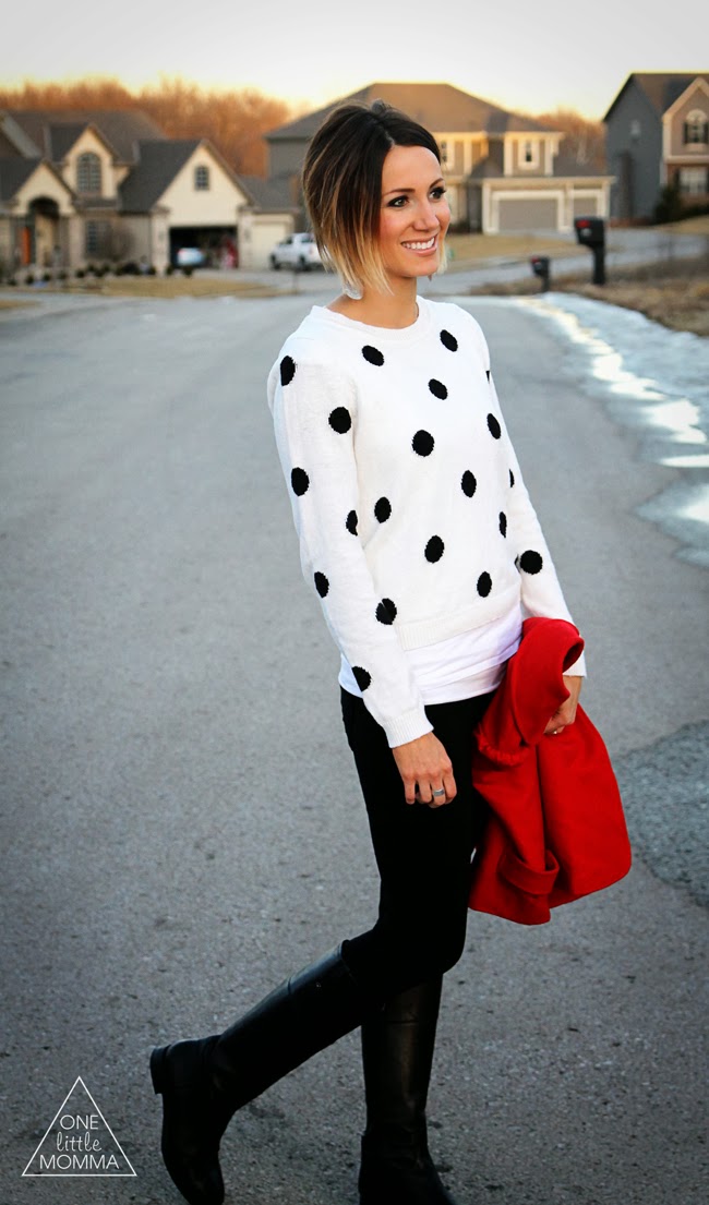 Black and white polka dot sweater, red coat