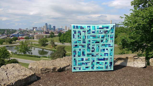Detour quilt in aqua and navy from Stash Statement quilting book by Kelly Young