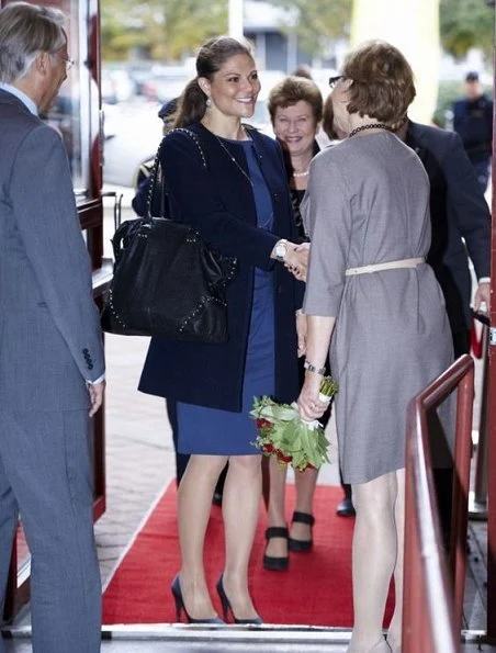 Crown Princess Victoria has attended the Hjarnfonden seminar in Malmö. By Malene Birger Studded Edelberga Bag
