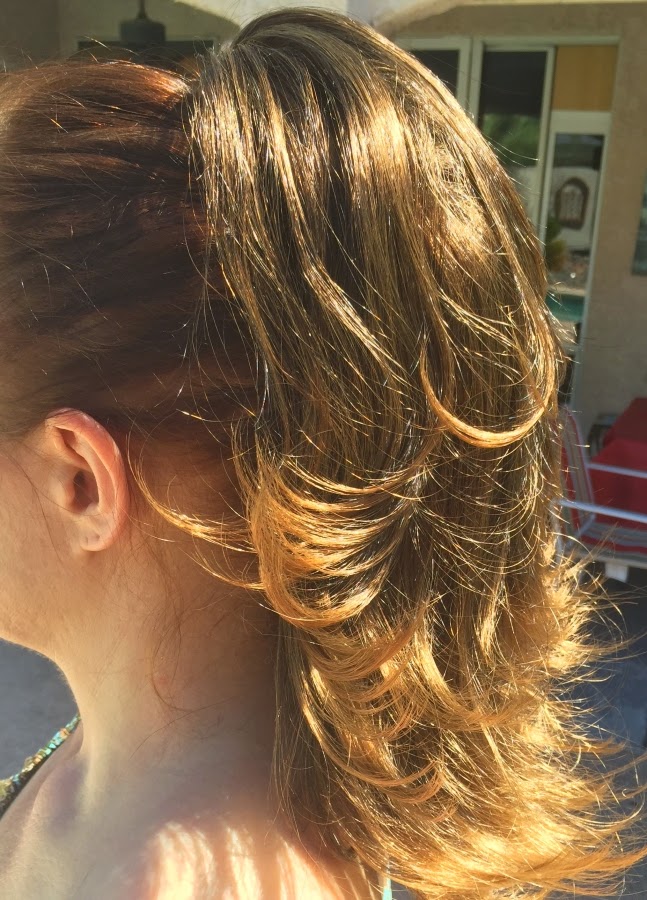 Side of curly clip on hairpiece