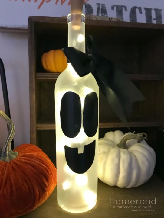 Halloween Wine Bottle Ghost with pumpkins and shelf