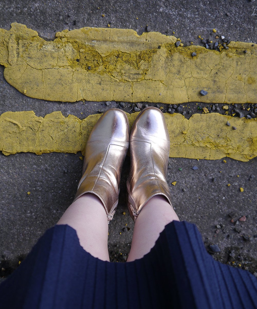 Shiny gold boots Styled by Helen, Scottish blogger, Dundee blogger, Scottish fashion blogger, quirky style, Scottish street style, cute style, cat clothing, dressing to a theme, cat themed clothing, cat jumper, colourful outfit, colourful street style, La La Land, colourful cat jumper, pink jumper, pink and blue outfit, red head, ginger bob, clear glasses, Iolla glasses, cat necklace, silver cat necklace, gold boots, cat pose, cute cat outfit, Wardrobe Conversations