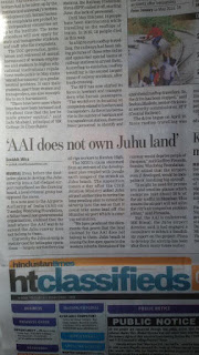 Illegal felling of trees and dumping of construction waste into Juhu Lake.