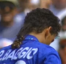 Roberto Baggio bows his head after missing his kick in the penalty shoot-out against Brazil at the 1994 World Cup
